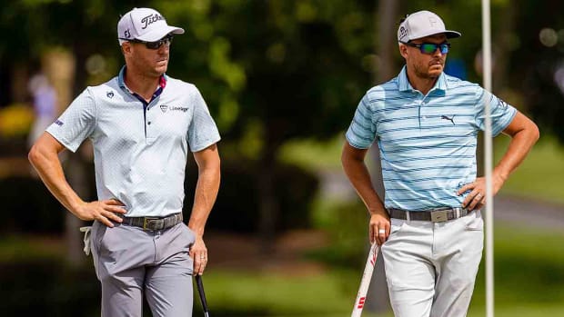 Justin Thomas and Rickie Fowler on the 4th green during the second round of the 2023 Wells Fargo Championship at Quail Hollow Club in Charlotte, N.C.